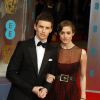Eddie Redmayne et sa petite amie Hannah lors des Bafta Awards à Londres, le 16 février 2014.