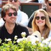 Antoine Arnault et sa compagne Natalia Vodianova lors de la finale homme des Internationaux de France de tennis de Roland-Garros à Paris, le 8 juin 2014.