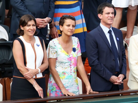 Anne Hidalgo, Najat Vallaud-Belkacem et Manuel Valls lors de la finale homme des Internationaux de France de tennis de Roland-Garros à Paris, le 8 juin 2014.