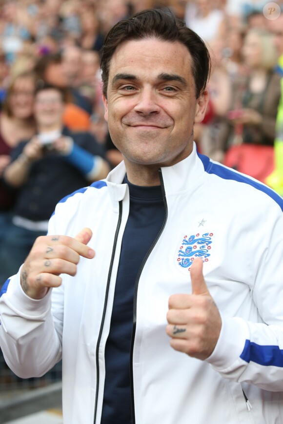 Robbie Williams lors de l'événement Soccer Aid qui opposait une équipe britannique à une équipe du Reste du monde, le 8 juin 2014 à Manchester, dans le but de venir en aide à l'UNICEF
