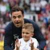Robbie Williams avant l'événement Soccer Aid qui opposait une équipe britannique à une équipe du Reste du monde, le 8 juin 2014 à Manchester, dans le but de venir en aide à l'UNICEF