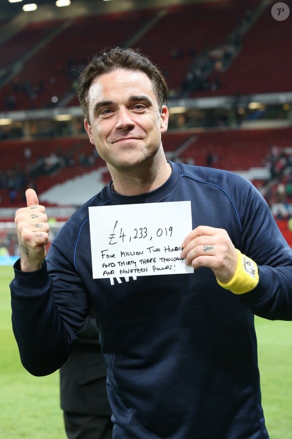 Soccer Aid, organisé par Robbie Williams, a rapporté 4 233 019 livres, qui seront reversés à l'Unicef, à Manchester le 8 juin 2014