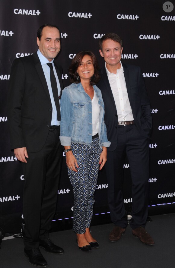 Messaoud Benterki, Nathalie Iannetta et Eric Besnard lors de la soireé de rentrée de Canal + organisée à Paris, le 28 août 2013.