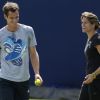 Andy Murray et Amélie Mauresmo pour leur premier entraînement au Queen's à Londres le 11 juin 2014.
