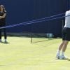 Andy Murray et Amélie Mauresmo pour leur premier entraînement au Queen's à Londres le 11 juin 2014.