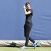 Andy Murray et Amélie Mauresmo pour leur premier entraînement au Queen's à Londres le 11 juin 2014.