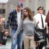 Exclusif -  Mila Kunis, enceinte, et son fiancé Ashton Kutcher arrivent à l'aéroport de La Nouvelle-Orléans pour prendre l'avion. Le 19 avril 2014.