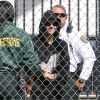 Justin Bieber sourit à sa sortie de prison à Miami, le 23 janvier 2014. 