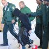 Exclusif - Justin Bieber menotté arrive au commissariat à Miami, le 23 janvier 2014. 