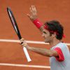 Roger Federer lors de son match contre Dimitry Tursonov aux Internationaux de France de tennis de Roland-Garros à Paris, le 30 mai 2014.