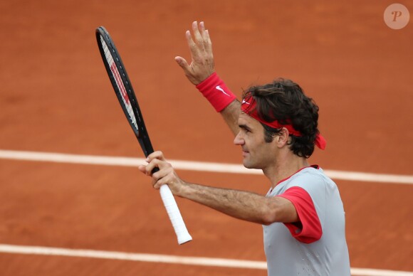 Roger Federer lors de son match contre Dimitry Tursonov aux Internationaux de France de tennis de Roland-Garros à Paris, le 30 mai 2014.