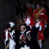 La reine Elizabeth II et le duc d'Edimbourg quittant la chapelle lors du service annuel de l'ordre de la jarretière, le 16 juin 2014 à la chapelle Saint George à Windsor.