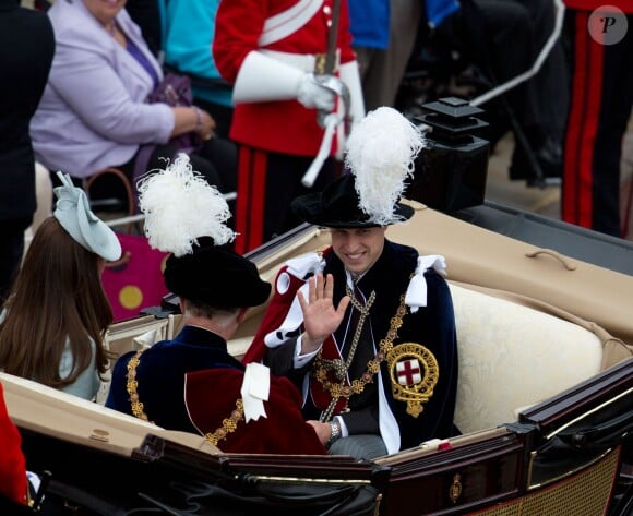 Kate Middleton, le prince William et le prince Charles en landau lors du service annuel de l'ordre de la jarretière, le 16 juin 2014 à la chapelle Saint George à Windsor.