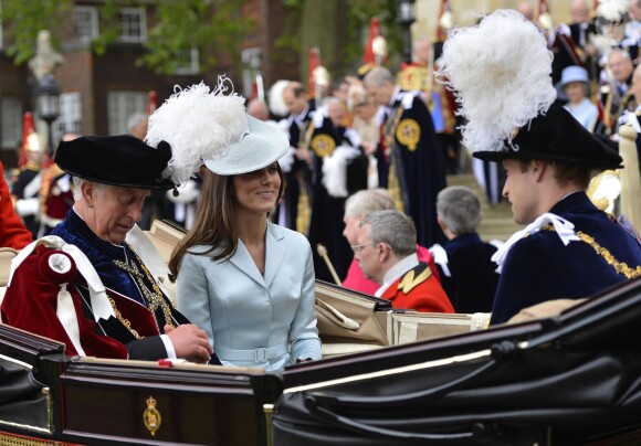 Britain's Catherine (C), the Duchess of Cambridge, her husband Prince William (R), the Duke of Cambridge, and Prince Charles (L), the Prince of Wales, leave by carriage after attending the Order of the Garter procession and installation service at Windsor Castle in southern England, June 16, . The Order is the senior and oldest British Order of Chivalry, founded by Britain's King Edward III in 1348. REUTERS/Toby Melville (BRITAIN - Tags: SOCIETY ANNIVERSARY ROYALS) ... Britain's royal family members leave by carriage after attending the Order of the Garter procession and installation service at Windsor Castle in southern England ... 16-06- ... WINDSOR ... United Kingdom ... Photo credit should read: TOBY MELVILLE/WPA Rota. Unique Reference No. ... in Windsor, UK, on Monday June 16, 2014. Photo by Arthur Edwards/PA Wire/ABACAPRESS.COM16/06/2014 - Windsor