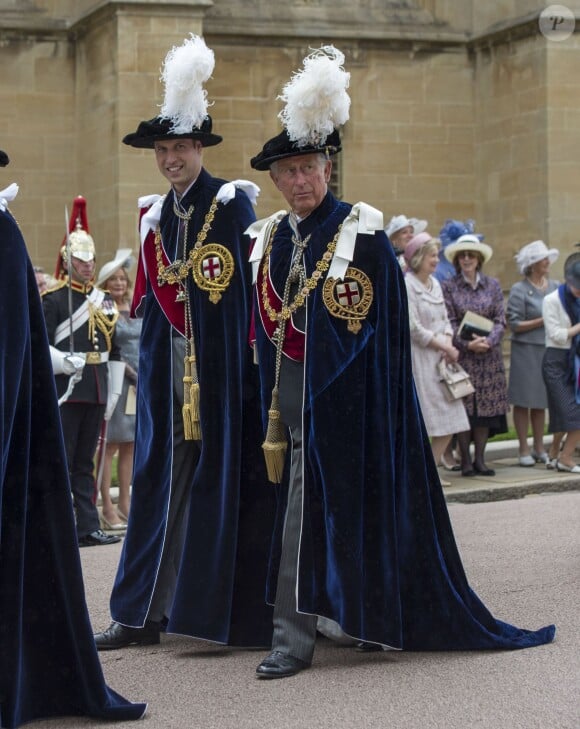 Le prince William et le prince Charles lors du service annuel de l'ordre de la jarretière, le 16 juin 2014 à la chapelle Saint George à Windsor.