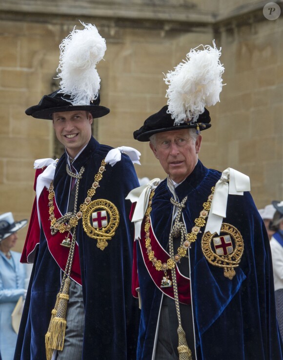 Le prince William et son père le prince Charles lors du service annuel de l'ordre de la jarretière, le 16 juin 2014 à la chapelle Saint George à Windsor.