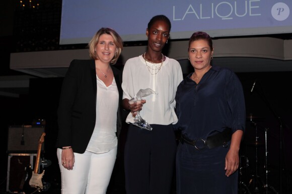 Rougui Dia, chef du Buddha Bar Hôtel à Paris, lauréate dans la catégorie Restauration, et Stéphanie Le Quéllec, chef d'hôtel Prince de Galles à Paris - 11ème édition du Prix Trofémina à la salle Wagram à Paris le 16 juin 2014. 