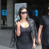 Kim Kardashian arrive à l'aéroport de Nice en provenance de New York dans le cadre du festival "Cannes Lions" le 18 juin 2014.