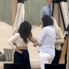 Kourtney Kardashian, enceinte et en plein shooting photo sur une plage, dans les Hamptons. Le 17 juin 2014.