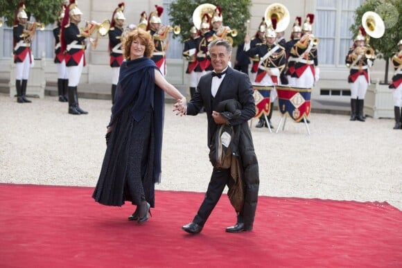 Gérard Holtz et sa femme Muriel Mayette-Holtz - Dîner d'état en l'honneur de la reine d'Angleterre donné par le président français au palais de l'Elysée à Paris, le 6 juin 2014, pendant la visite d'état de la reine après les commémorations du 70ème anniversaire du débarquement.