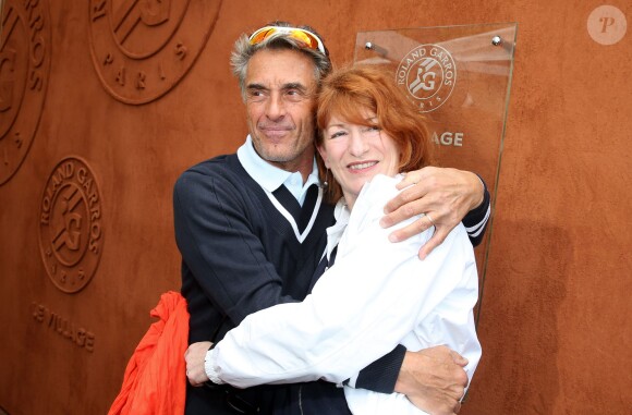 Gérard Holtz et sa femme Muriel Mayette - People au village des Internationaux de France de tennis de Roland Garros à Paris, le 29 mai 2014.