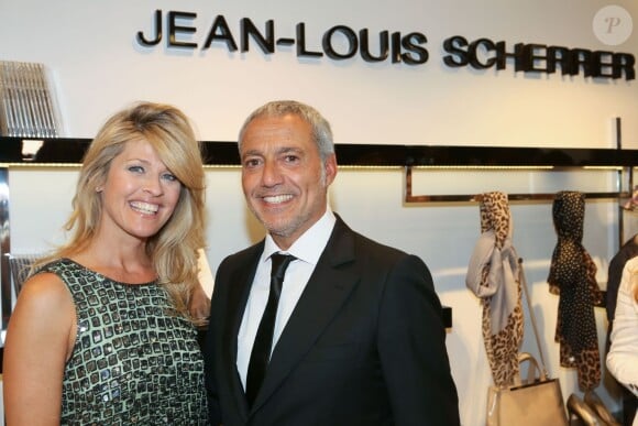 Lynda Lacoste et son compagnon Bruno Bensoussan à l'inauguration de la nouvelle boutique Jean-Louis Scherrer au 111, rue du faubourg Saint-Honoré à Paris, le 19 juin 2014.
