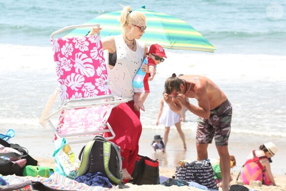 Gwen Stefani, Gavin Rossdale et leur fils sur une plage de Santa Monica. Le 21 juin 2014.
