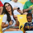  Ludivine Sagna et son fils Lenny lors du match de l'&eacute;quipe de France face &agrave; l'Equateur, le 25 juin 2014 au stade Maracan&atilde; de Rio 