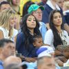 Fiona Cabaye, Mazda Sakho avec sa fille Aïda et Ludivine Sagna lors du match de l'équipe de France face à l'Equateur, le 25 juin 2014 au stade Maracanã de Rio