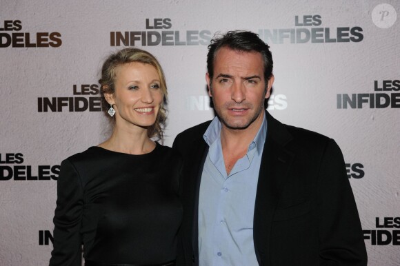 Alexandra Lamy et Jean Dujardin lors de l'avant-premiere des Infidèles à Paris le 14 fevrier 2012