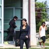 Kim, Kourtney Kardashian et leur mère Kris Jenner quittent une salle de gym. Southampton, le 1er juillet 2014.