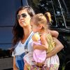 Kourtney Kardashian (enceinte) avec son mari Scott Disick, leurs enfants Mason et Penelope et Kim Kardashian lors d'une virée campagne dans les Hamptons près de New York, le 3 juillet 2014.