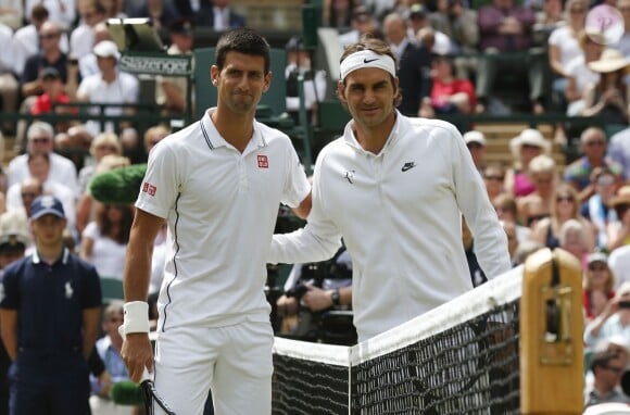 Novak Djokovic et Roger Federer lors de la finale homme, à Wimbledon, le 6 juillet 2014.