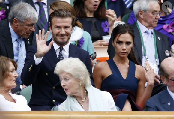 David et Victoria Beckham assistent à la finale homme, à Wimbledon,  entre Roger Federer et Novak Djokovic, le 6 juillet 2014.