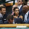 David et Victoria Beckham ainsi que Samuel L. Jackson assistent à la finale homme, à Wimbledon,  entre Roger Federer et Novak Djokovic, le 6 juillet 2014.