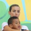 Ludivine Sagna et son fils Elias lors du match France - Allemagne à Rio de Janeiro au Brésil le 4 juillet 2014