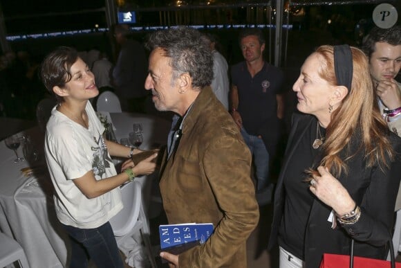 Exclusif - Marion Cotillard et Bruce Springsteen - Premier jour du Paris Eiffel Jumping présenté par Gucci, septième étape du Longines Global champions tour, à Paris le 4 juillet 2014.