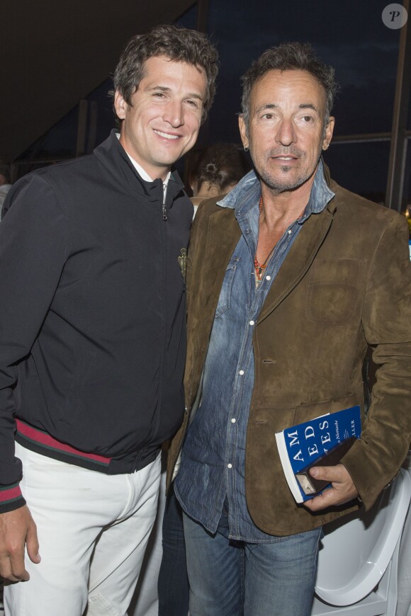 Exclusif - Guillaume Canet et Bruce Springsteen - Premier jour du Paris Eiffel Jumping présenté par Gucci, septième étape du Longines Global champions tour, à Paris le 4 juillet 2014.