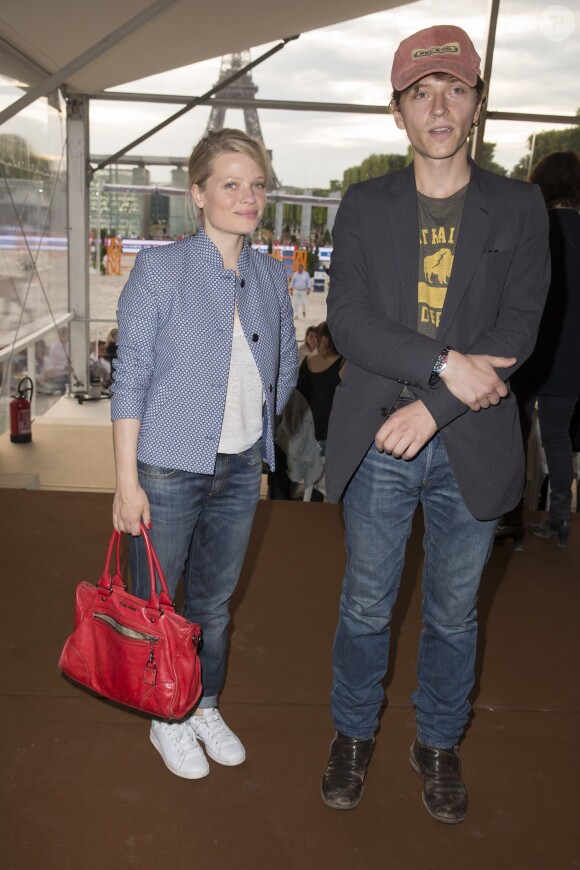 Exclusif - Mélanie Thierry et Raphaël - Premier jour du Paris Eiffel Jumping présenté par Gucci, septième étape du Longines Global Champions Tour, à Paris le 4 juillet 2014.