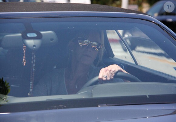 Melanie Griffith sort d'un déjeuner avec un ami à West Hollywood, le 9 juillet 2014.