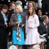 Anne Gravoin, épouse du Premier ministre Manuel Valls, et Véronique Bartolone, épouse de Claude Bartolone, président de l'Assemblée nationale - Défilé pour la Fête nationale sur les Champs-Elysées en hommage aux sacrifice des troupes alliées dans la Première Guerre mondiale il y a cent ans. Le 14 juillet 2014.