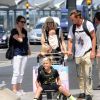Gwen Stefani, son mari Gavin Rossdale arrivant à l'aéroport de Londres avec leurs enfants Kingston, Zuma et Appolo le 24 juillet 2014.