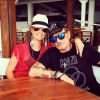 Johnny Hallyday et Laeticia au Nikki Beach en vacances à Saint-Barthélémy, juillet 2014.