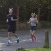 Exclusif - Geri Halliwell et son compagnon Christian Horner font du jogging près chez la chanteuse à Londres, le 31 juillet 2014. 