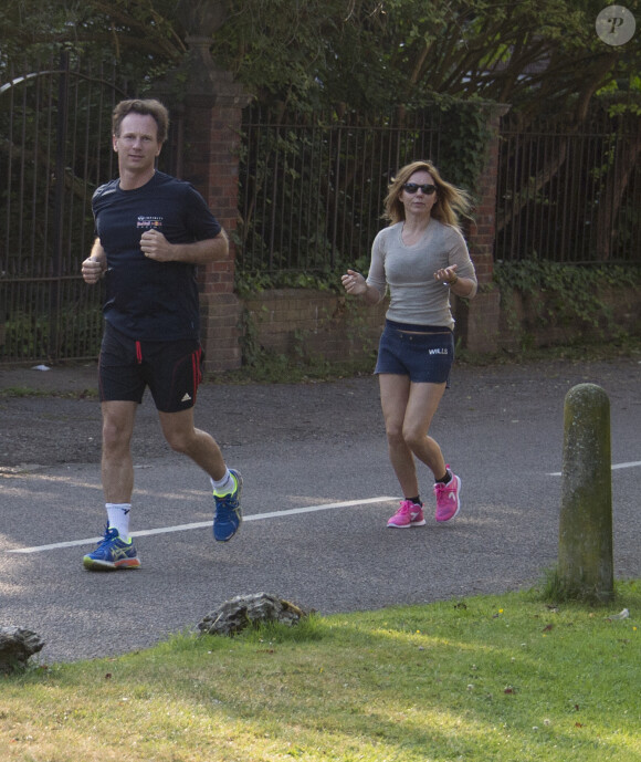 Exclusif - Geri Halliwell et son compagnon Christian Horner font du jogging près chez la chanteuse à Londres, le 31 juillet 2014. 