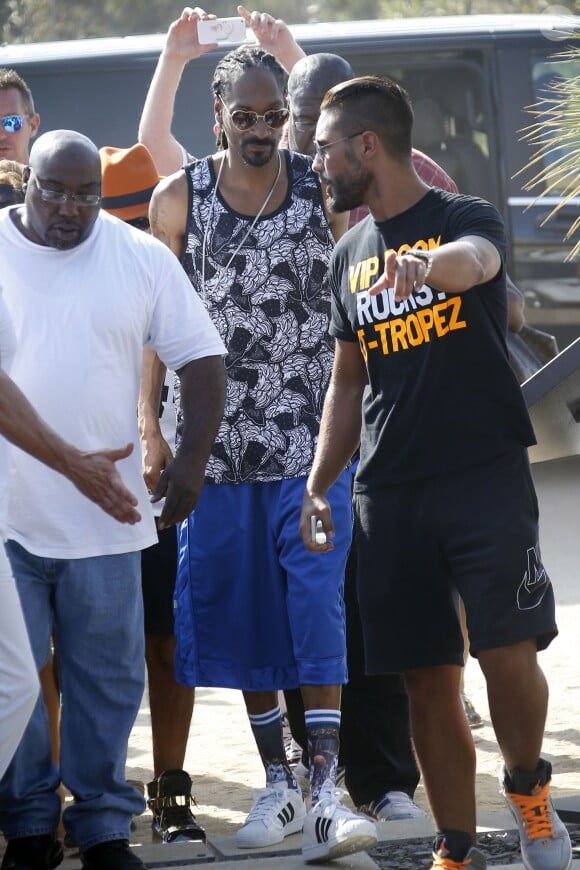 Snoop Dogg arrive à l'Eden Plage pour un DJ set en plein après-midi. Saint-Tropez, le 5 août 2014.