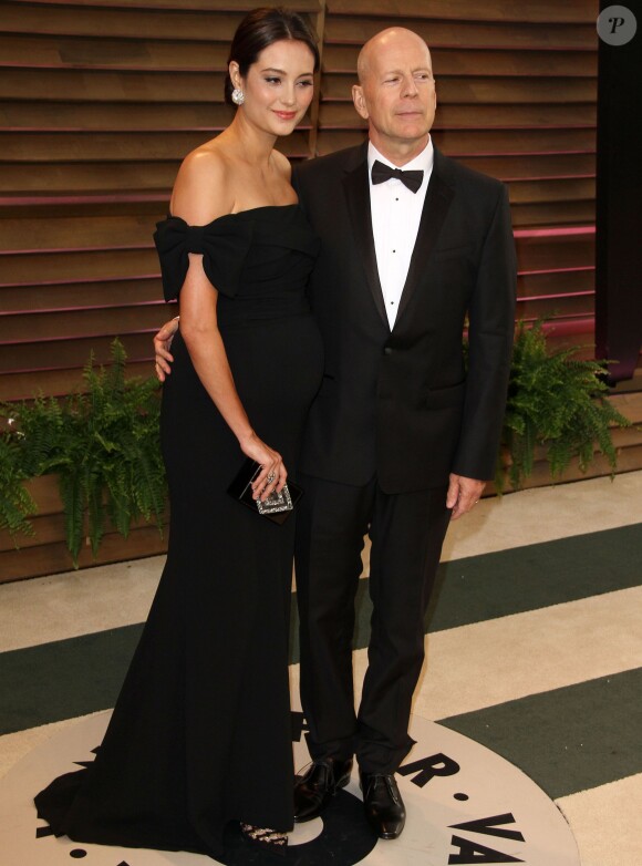 Bruce Willis et son épouse Emma Heming (enceinte) lors de la soirée Vanity Fair après la 86 ème cérémonie des Oscars, le 2 mars 2014.