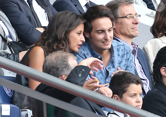 La belle Malika Ménard et son frère Raphaël assistent au match PSG-Bastia pour la 2ème journée 2014/2015 au Parc des Princes le 16 août 2014 à Paris.