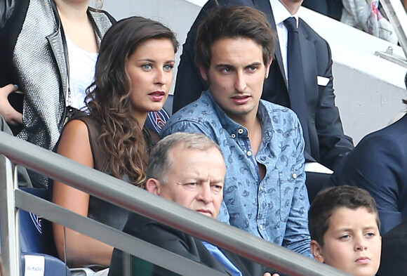 Malika Ménard et son frère Raphaël assistent au match PSG-Bastia au Parc des Princes le 16 août 2014 à Paris.