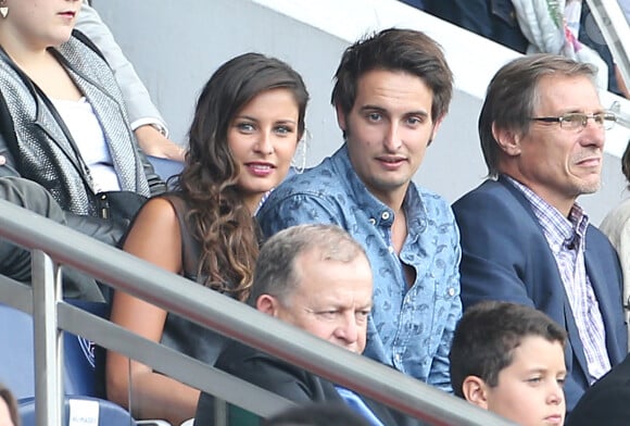 Malika Ménard et son frère Raphaël assistent au match PSG-Bastia pour la 2ème journée 2014/2015 au Parc des Princes le 16 août 2014 à Paris.